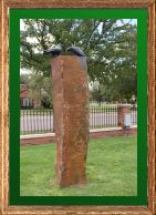 basaltrockwithtwobronzeravens
